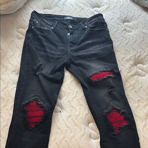 Black Distressed Jeans with Red Accents